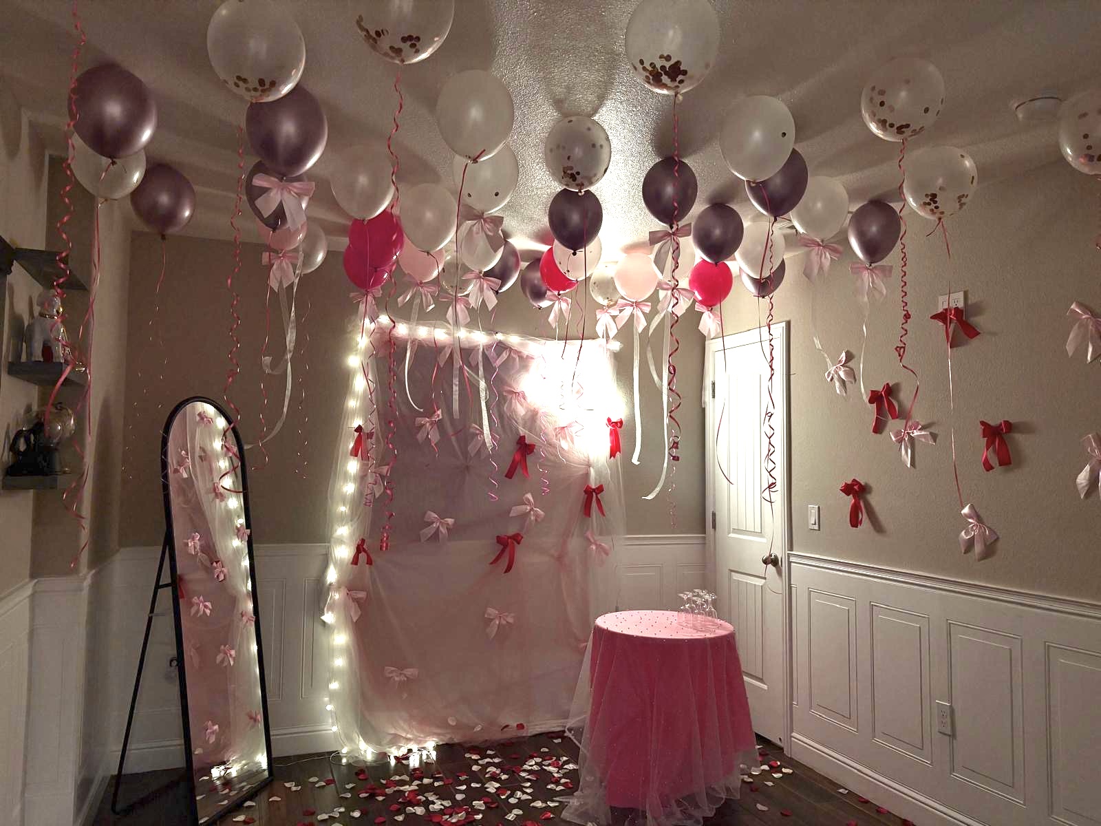 Pink balloon ceiling & tulle backdrop